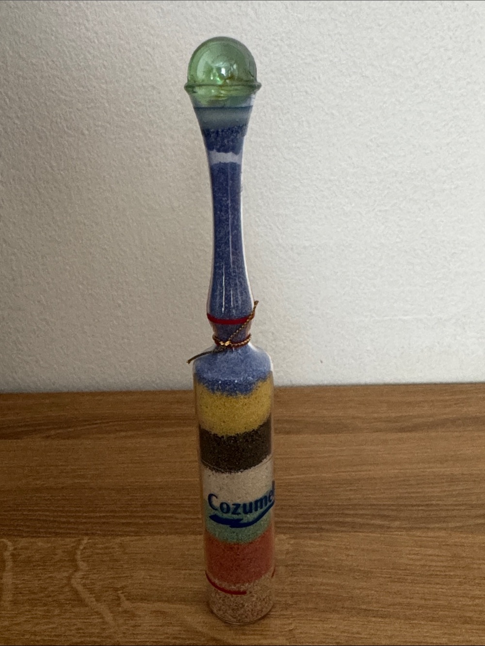 Bottle with colorful sands from Cozumel